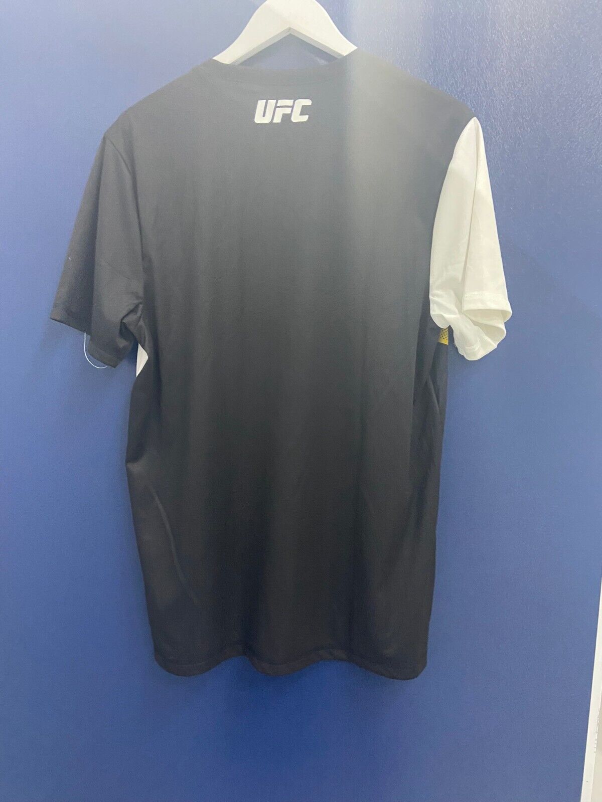 UFC Reebok adult large plain walk out tee black/yellow - Small mark on top