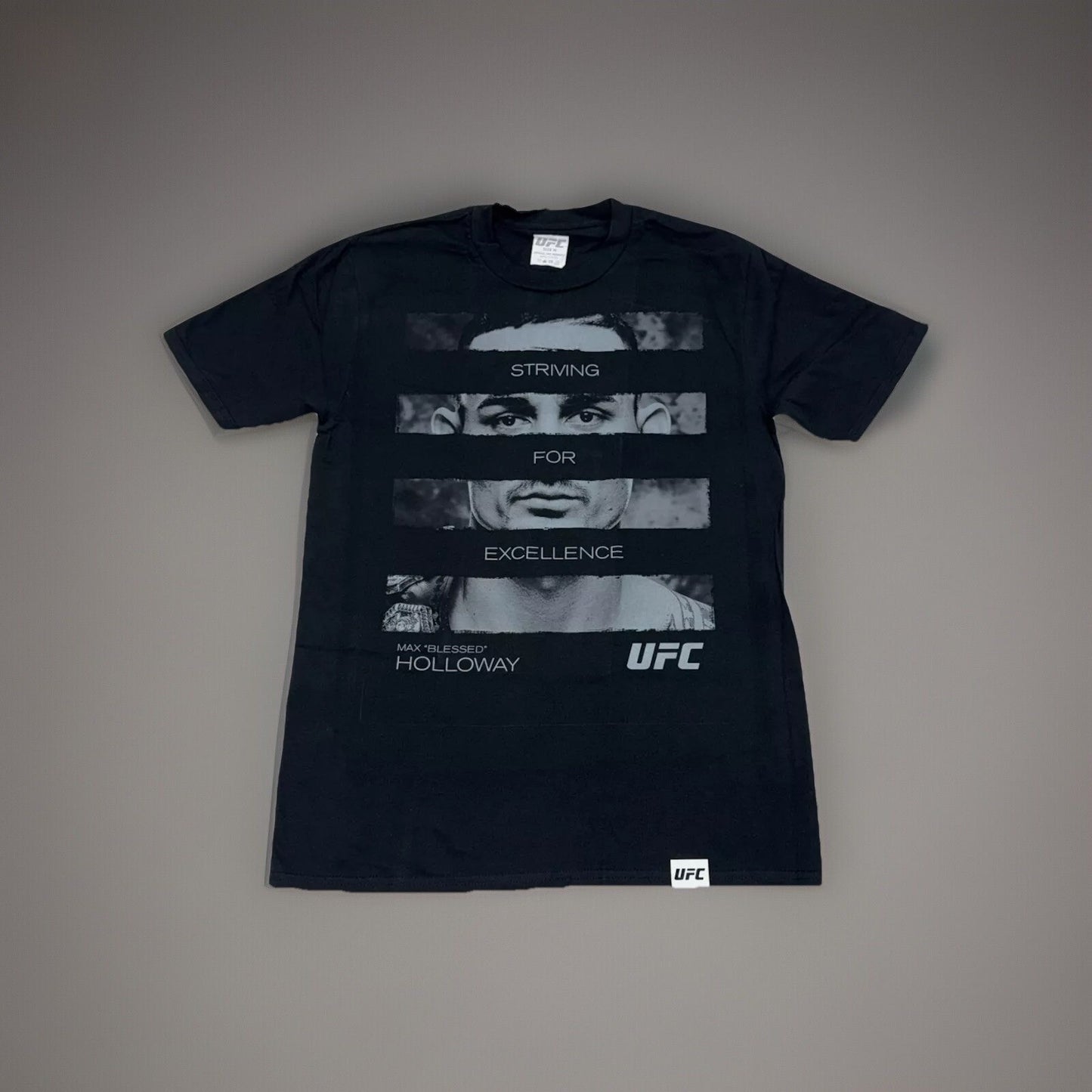 Official UFC Max Holloway 'Striving for Excellence Graphic T-shirt Adults