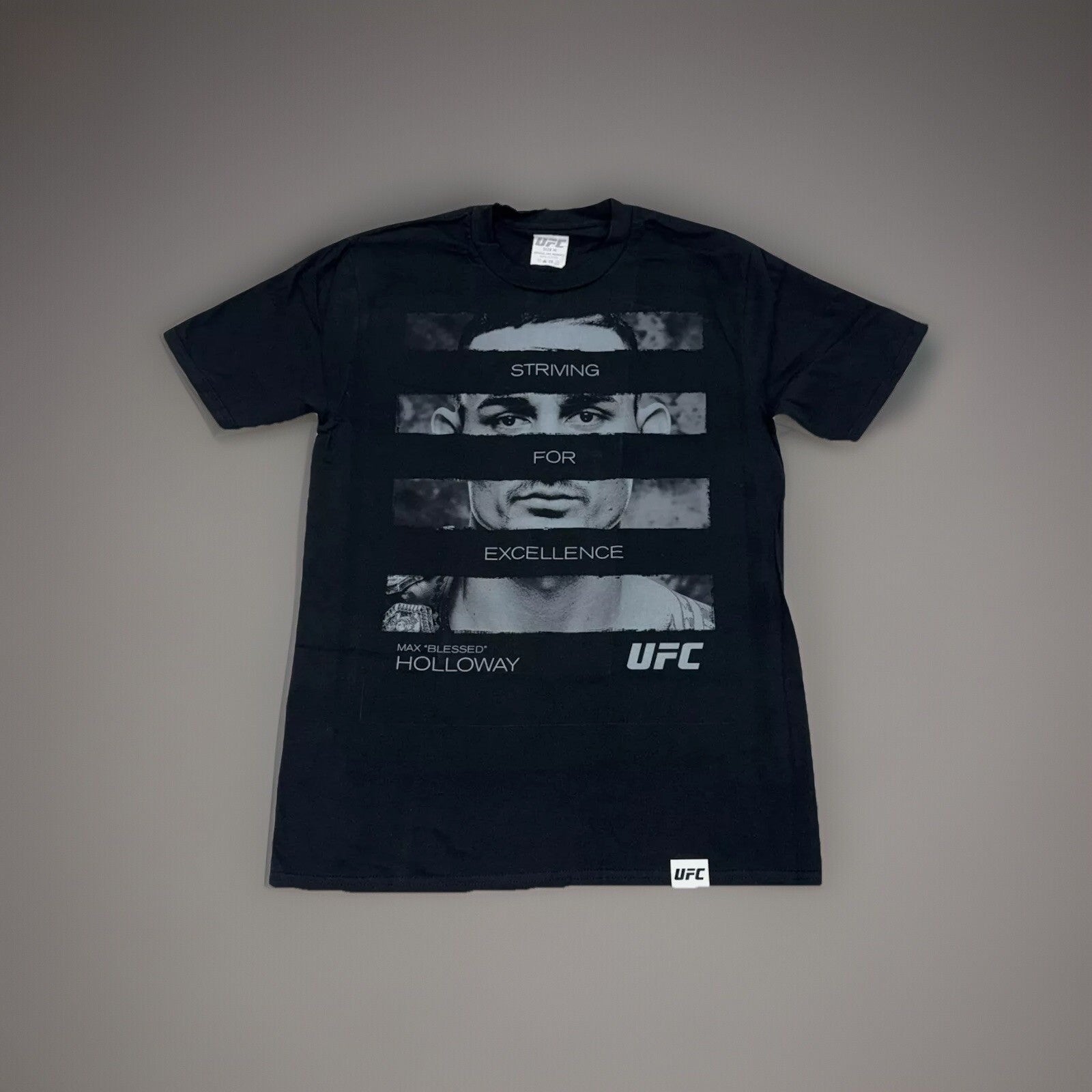 Official UFC Max Holloway 'Striving for Excellence Graphic T-shirt Adults